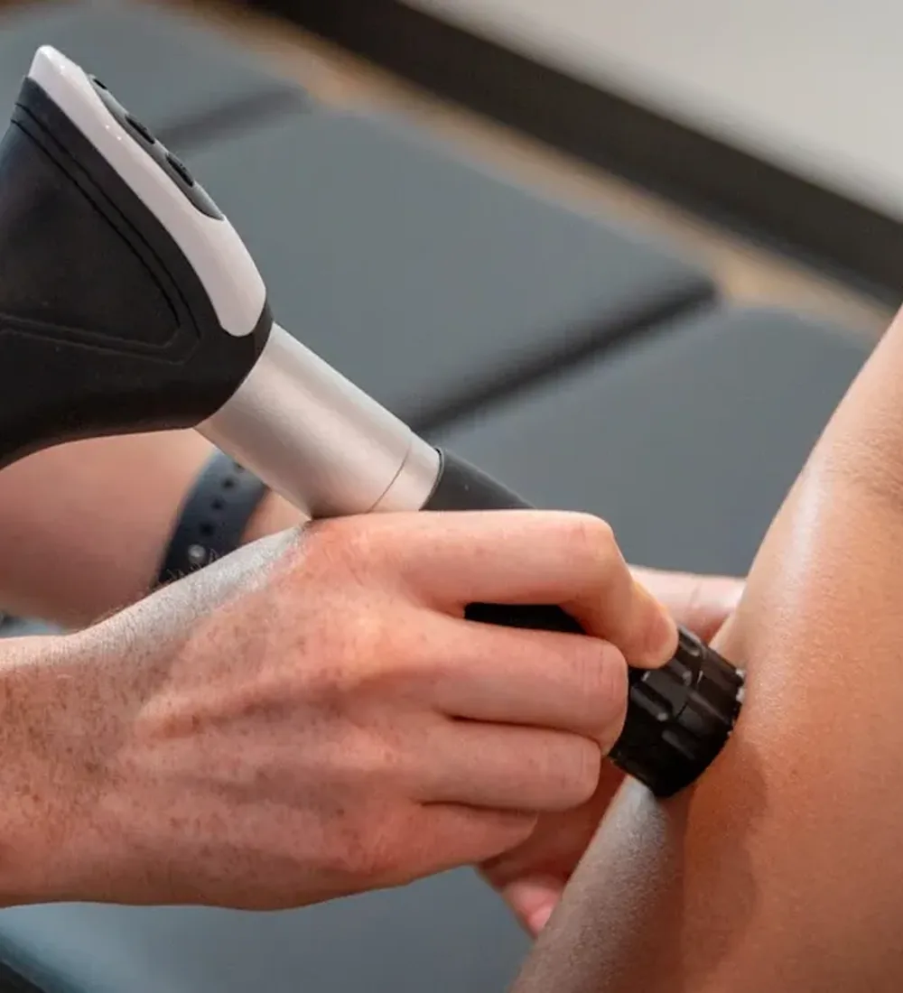 Dr. Andrew Kakishita treating a patient at Kinetic Chiropractic